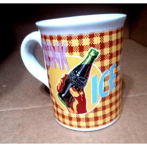 Coca-Cola yellow and red checked coffee mug by Gibson